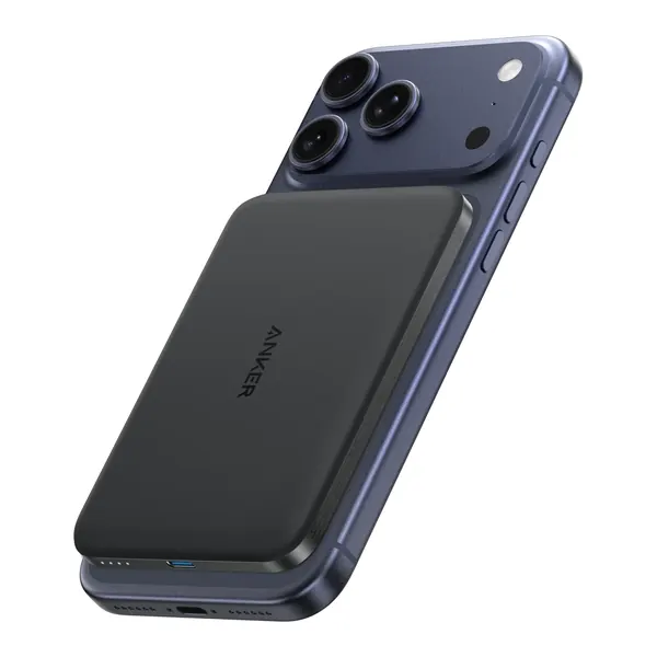 Anker Nano 5K MagGo Slim stuck magnetically to the back of a phone.