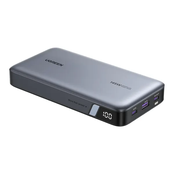 UGREEN Nexode 145W: a flat grey power bank with a small display and three ports.